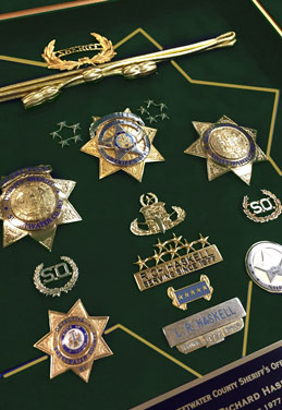 custom jersey framing, lamination services in colorado, giclee printing in colorado, shadowbox framing, framing badges and awards, framing military items